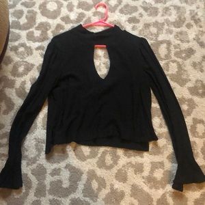 Free people black blouse with peep hole in front and back
